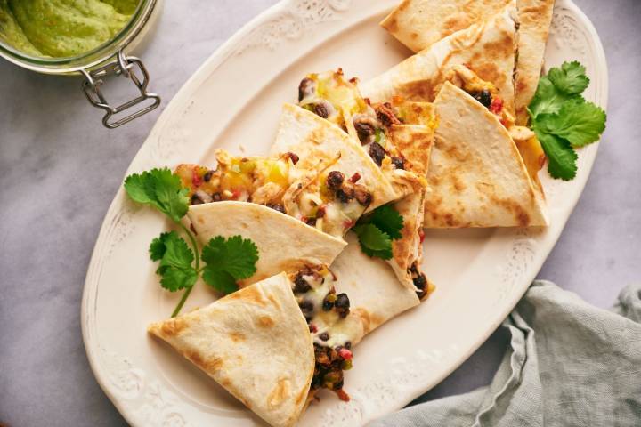 Healthy Thanksgiving Leftover Ideas Leftover turkey quesadillas with shredded turkey, black beans, and corn.