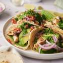 60 Delicious and Easy Taco Recipes Chicken street tacos with avocado, pickled onions, tomatoes, and grilled chicken.