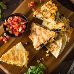 Healthy Chicken Quesadillas Healthy chicken quesadillas with pico de gallo on the side.
