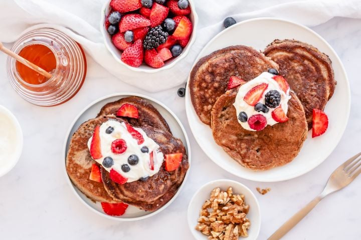 Almond Flour Pancakes with Flax Almond flour pancakes with flax served with fresh berries, yogurt, nuts, and honey.