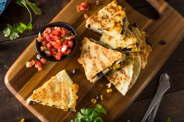 Healthy Chicken Quesadillas Healthy chicken quesadillas with pico de gallo on the side.