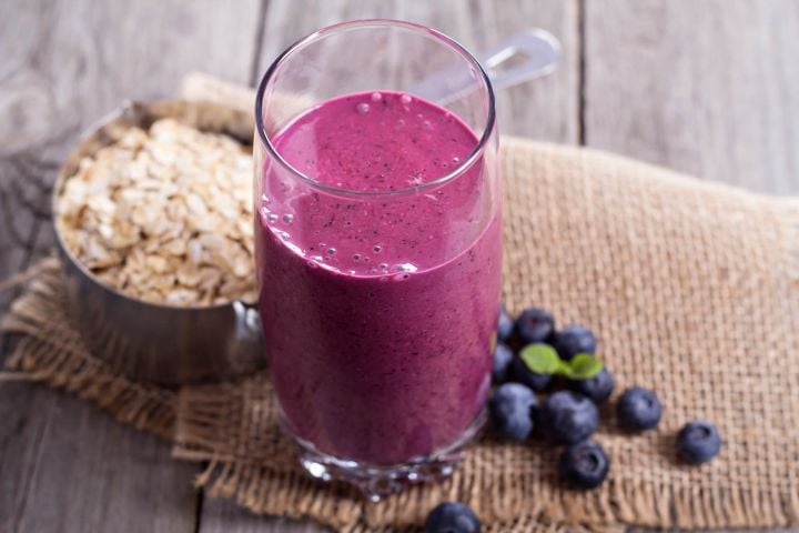 Healthy Oatmeal Smoothies Oatmeal smoothies made with blueberries in a glass.