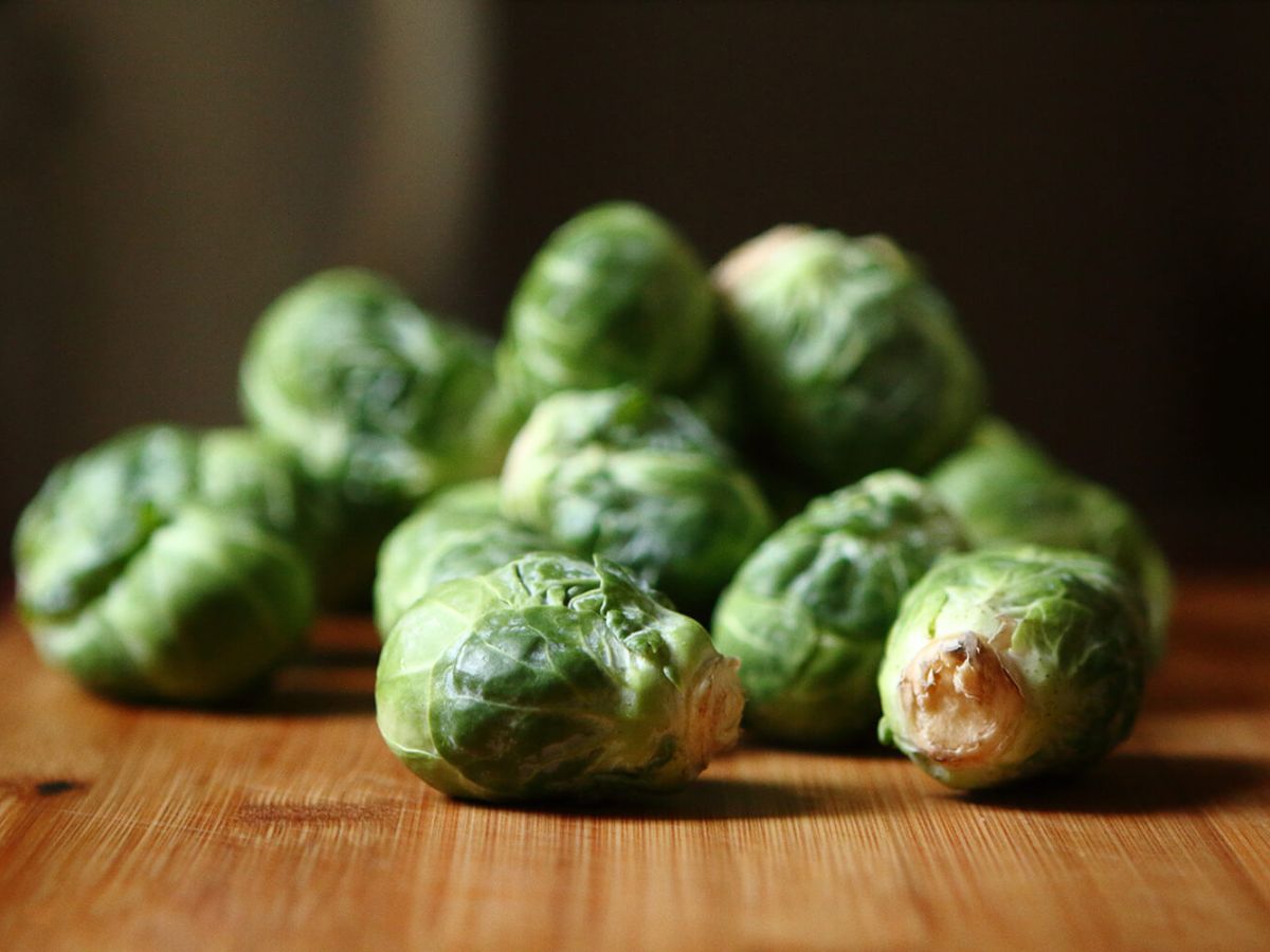 Healthy Brussels Sprouts Recipes Brussels spouts on a wood table