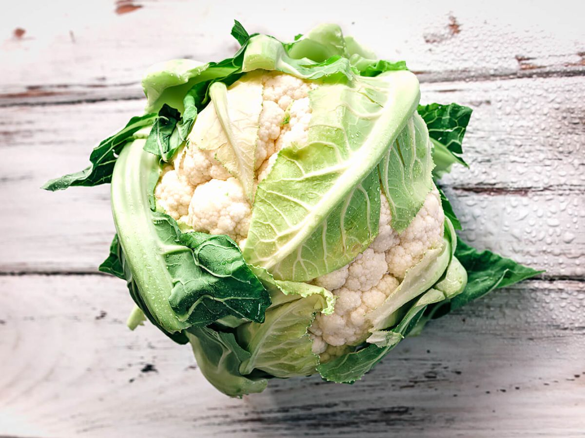 Healthy Cauliflower Recipes Fresh cauliflower on a wooden surface