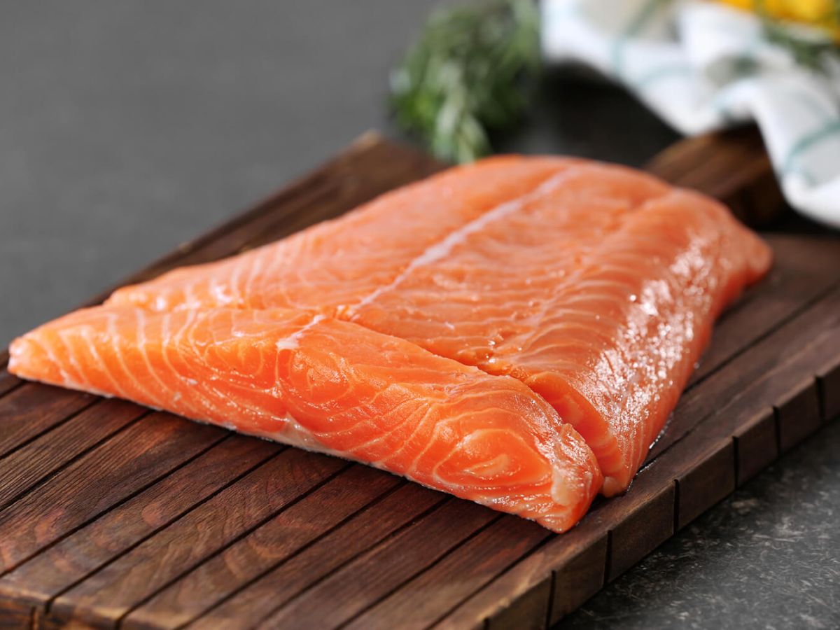 Healthy Salmon Recipes Salmon meat on brown chopping board